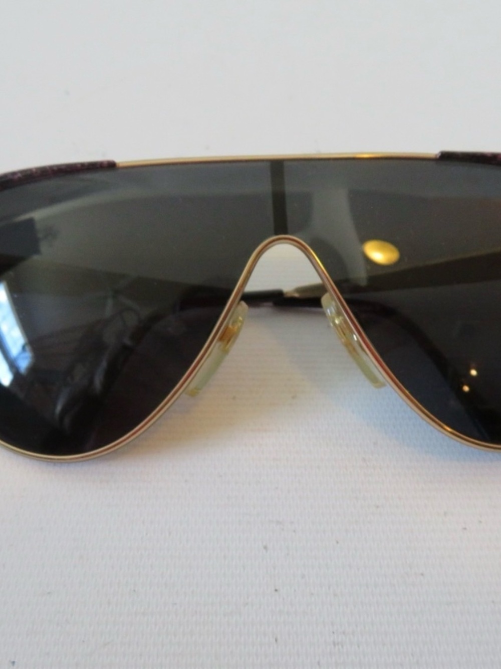 Gucci Oversized Shield Sunglasses in Gold and Black